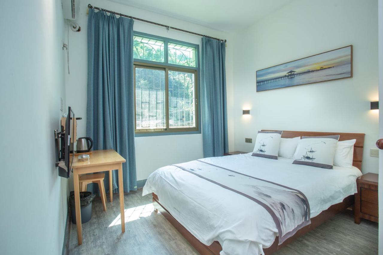 Nanjing Tulou Xinyuan Homestay ภายนอก รูปภาพ